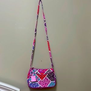Vera Bradley crossbody bag. 9 by 6. Very colorful and floral print.